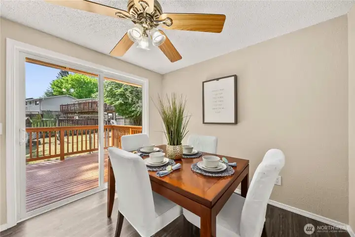 Access to the back deck extends the living and dining area