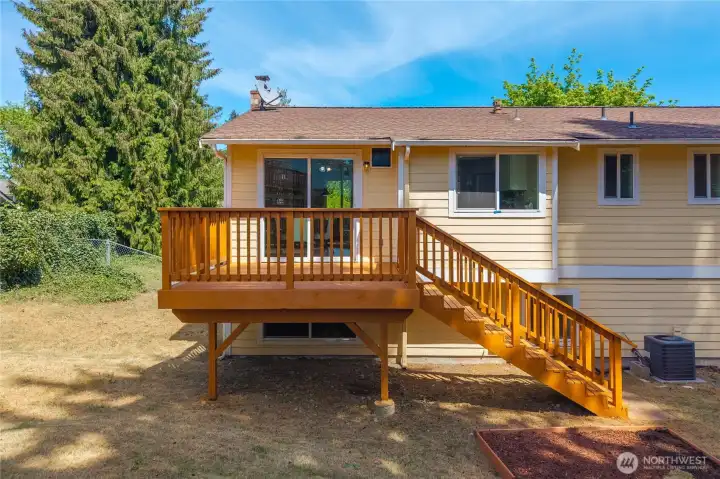 The newly painted back deck provided direct backyard access