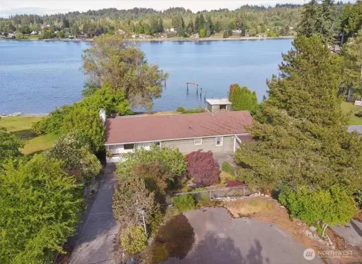 Large lot, over 40'of waterfront and lots of parking. This gem is ready for you to make her shine again!