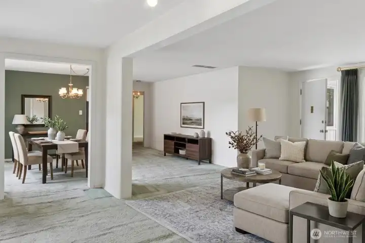 Living and dining areas, great views! Digitally staged.