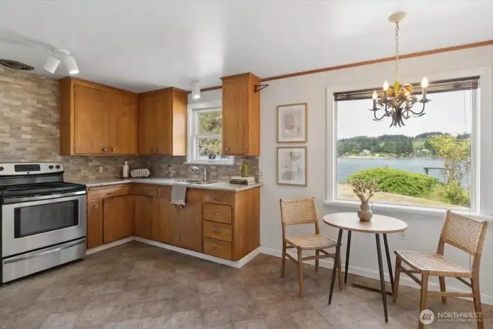 Kitchen is a nice size, recently remodeled and has great views! Digitally Staged.