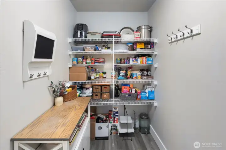 Walk-in Pantry as you enter from Garage