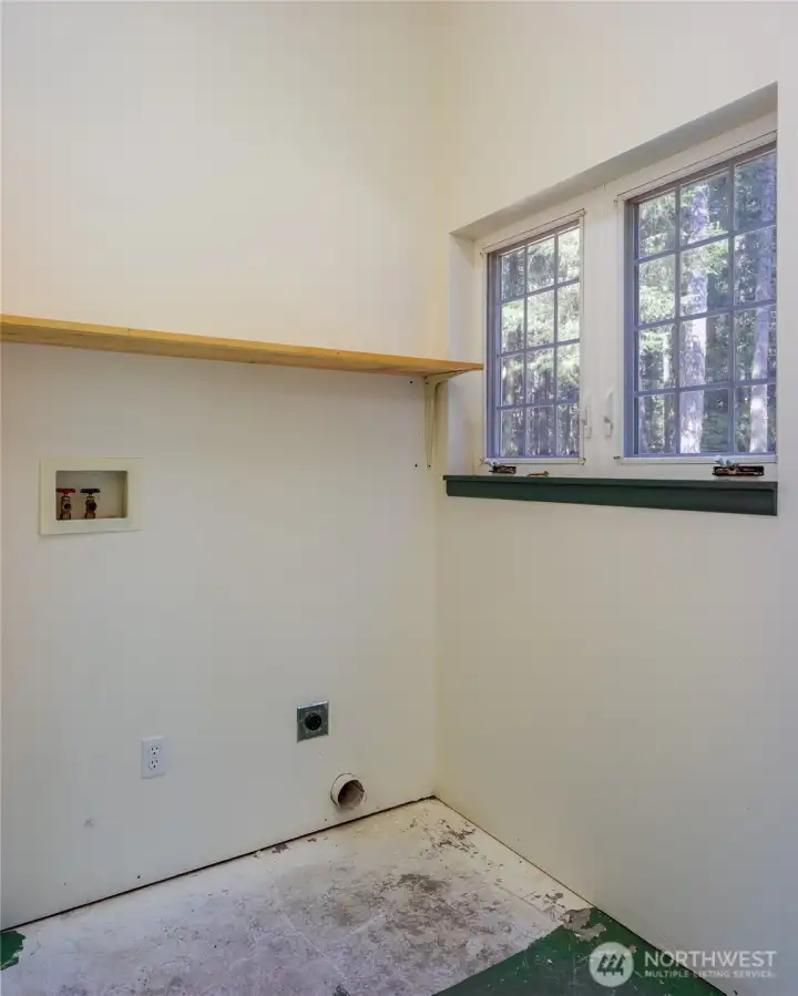 Second room on back of carport is all set for the washer and dryer.