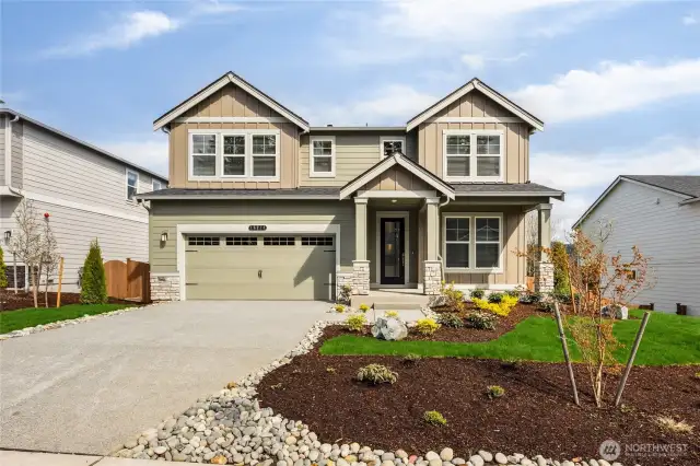 Photo is of actual home under construction.