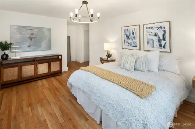 Primary bedroom with double closets and attached bathroom.