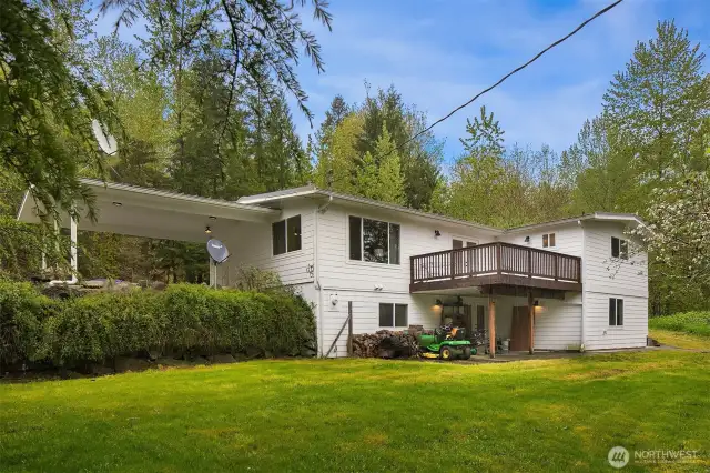 Large deck off the living room and covered patio out the back of the property