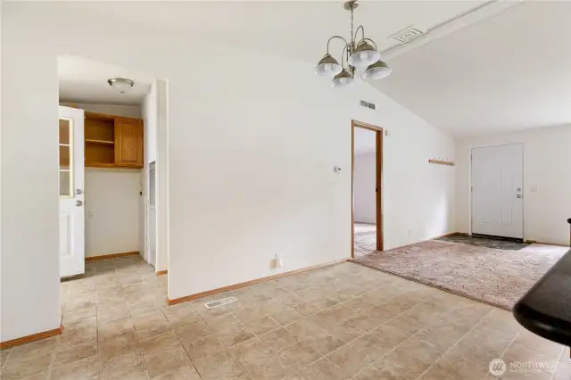 Dining area off Kitchen leads to utility room and to big Deck out back.  Great for BBQ and Friends