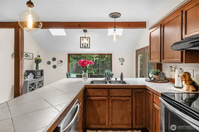 Kitchen with peaceful views of nature out the window.