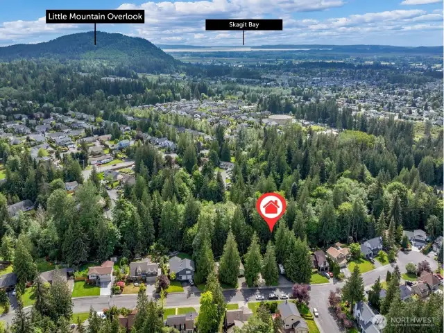 Tucked at the edge of town, nestled into nature but minutes from amenities and highways.