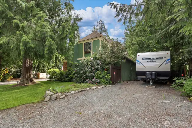 RV/Boat Parking -Private gated side parking perfect for RVs, trailers, or boats with room to spare.