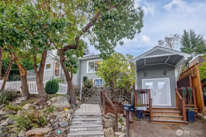 Terraced front for easy maintenance. Separate She-Shed provides a separate fun office space or storage area.