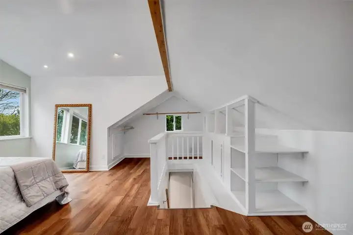 Upstairs loft bedroom faces West and has a breathtaking view and plenty of built in storage
