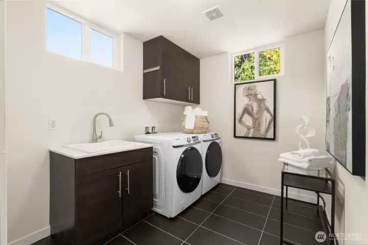 Spacious Laundry Room with Sink & Folding Space