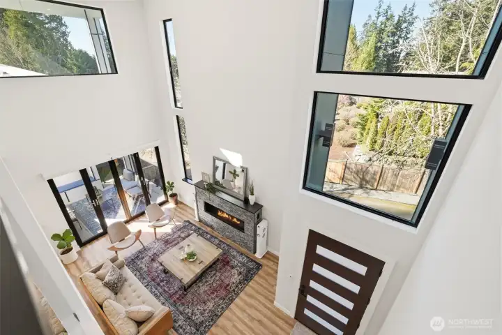 Walls of windows flood the home with natural light!