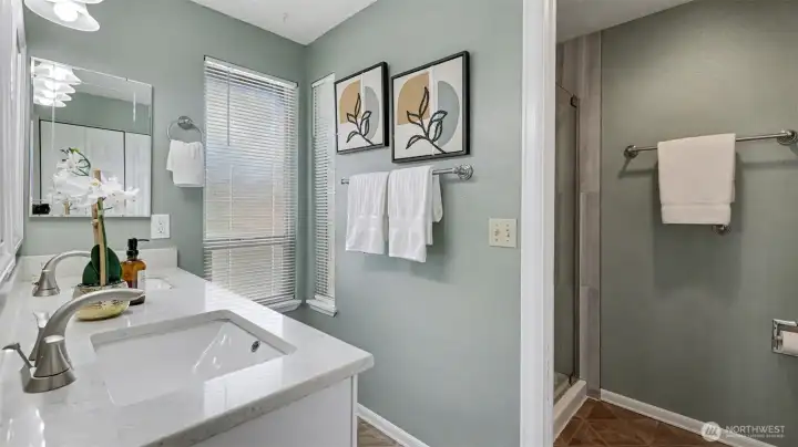 Remodeled primary bathroom on upper level.
