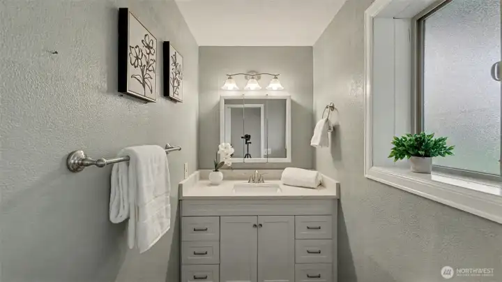 Downstairs bathroom, updated with quartz counters.