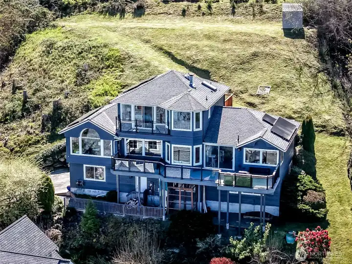 Great house and spacious hillside backyard!