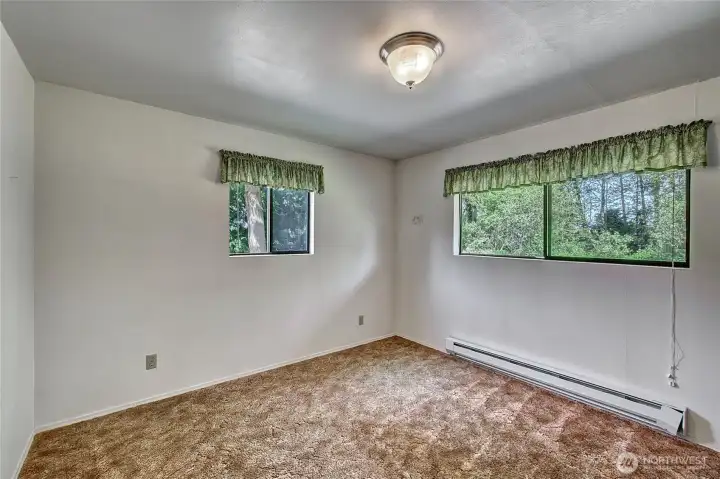 Extra finished room with a closet