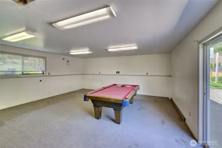Finished room in the detached building behind the home