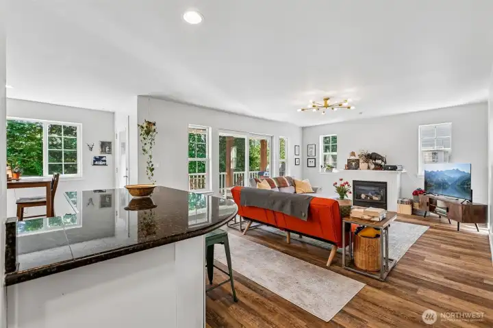 Open concept kitchen/dining/living