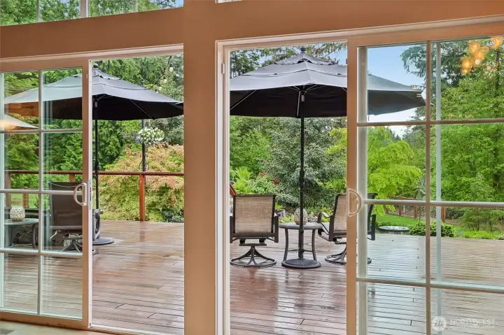 sliding doors open to expansive deck