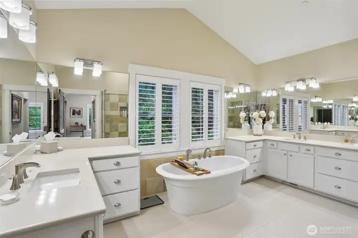primary suite bathroom with heated ceramic tile