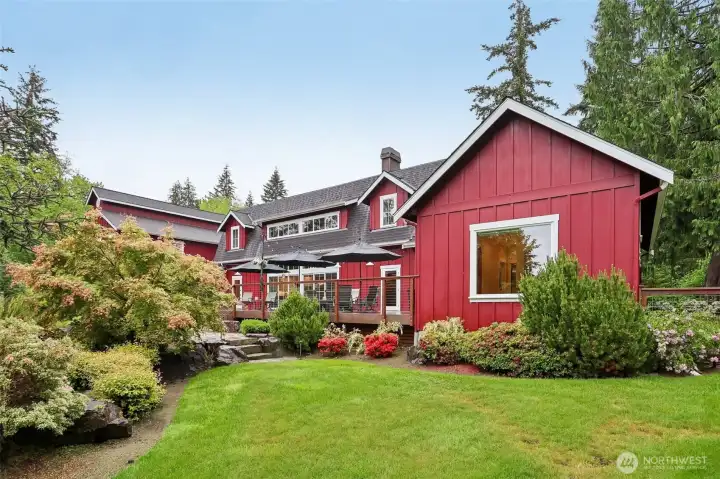 primary suite enjoys views of beautiful backyard