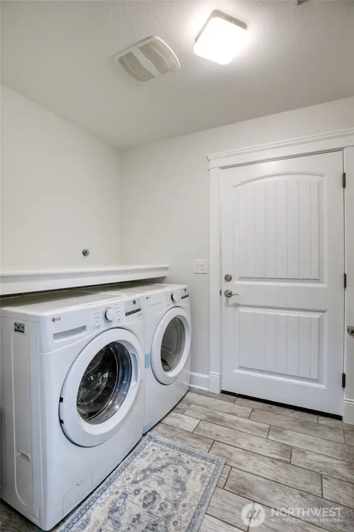 Laundry area with access to the garage