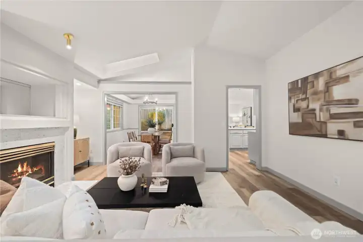 Vaulted ceilings + skylights make the living room especially welcoming and bright.