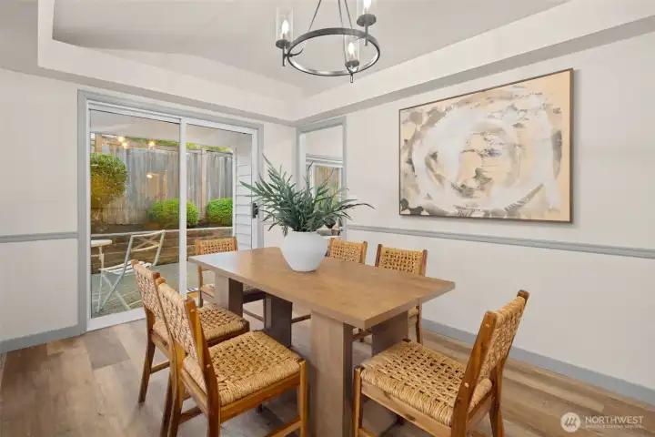 Formal dining room with sliding glass doors out to the patio.