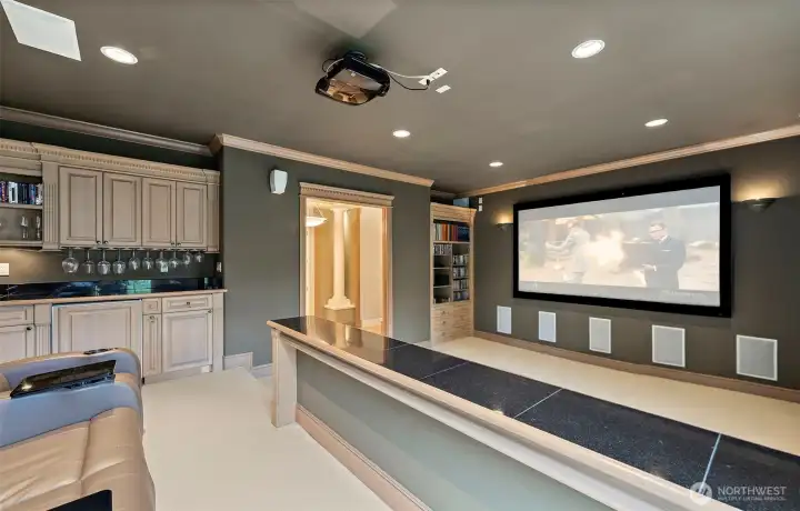 State of the Art Theatre Room with Wet Bar & Built-in Speaker System State of the Art Theatre Room with Wet Bar & Built-in Speaker System