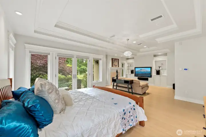 Stunning Primary Suite with Coffered Ceilings, Wood Wrapped Windows, Private Patio, & Spacious Alcove Retreat Stunning Primary Suite with Coffered Ceilings, Wood Wrapped Windows, Private Patio, & Spacious Alcove Retreat