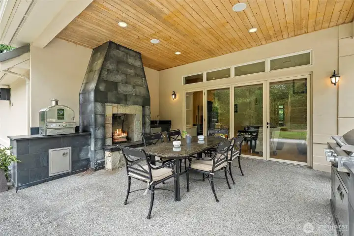 Entertain year round under the covered patio with a built-in Fireplace, Infrared Grill and Pizza Oven. Entertain year round under the covered patio with a built-in Fireplace, Infrared Grill and Pizza Oven.