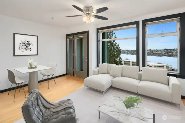 This stylish 4th floor condominium enjoys expansive and unobstructed views of Lake Union, Cascades, Gas Works Park & 4th of July fireworks! Virtual staging.