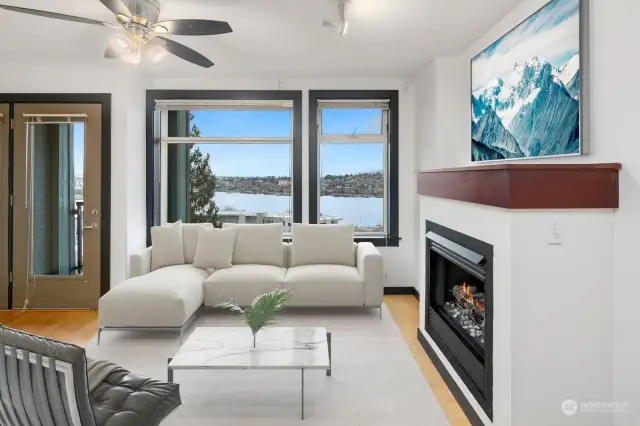 This stylish 4th floor condominium enjoys expansive and unobstructed views of Lake Union, Cascades, Gas Works Park & 4th of July fireworks! Virtual staging.