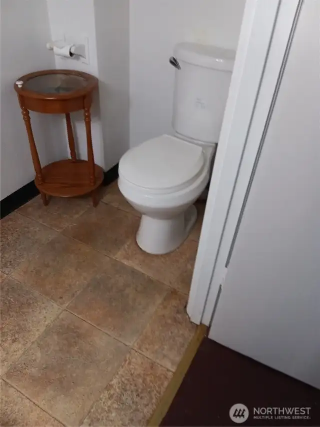 Upstairs half bathroom.
