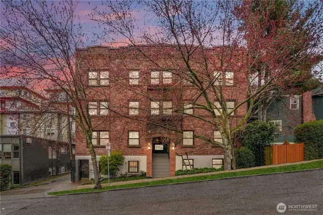 Welcome to a classic 1917 brick condominium building in the heart of Cap Hill.