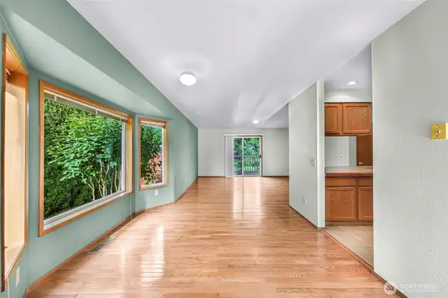 Dining rm with more bright light from large windows