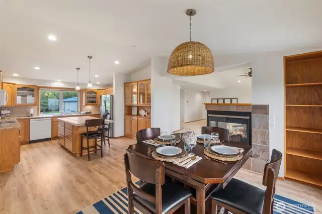 Dining with fireplace and ocean view