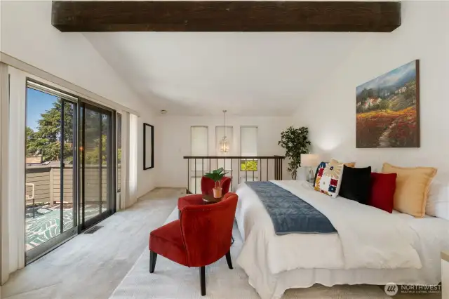 Primary bedroom with a deck