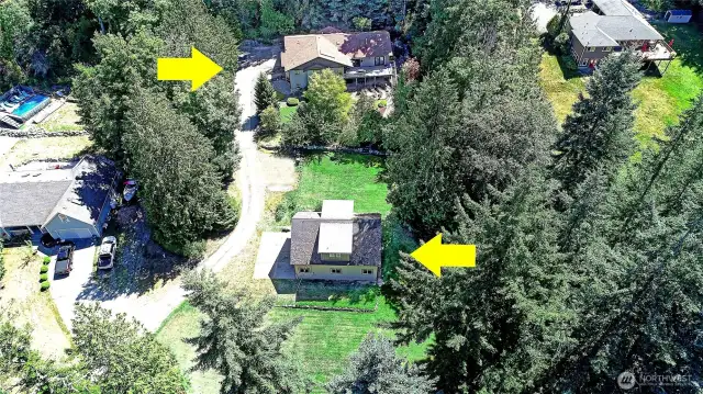 Park-like professionally landscaped grounds provide privacy for your forever home with main level living, attached ADU for guests or assistance, separate apartment above RV garage for extra guests or potential rental income.