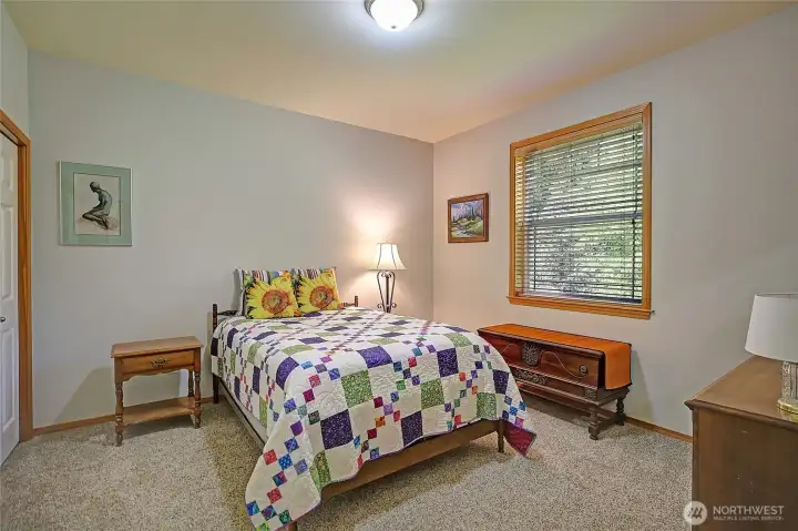 Bedroom in guest wing with adjoining full bath
