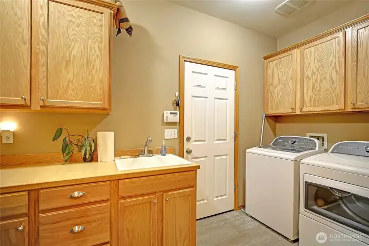 Main level laundry room. Second laundry room serves the lower level apartment