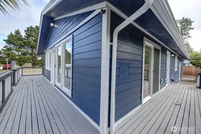 Wrap around deck with handicap ramp to the back door.