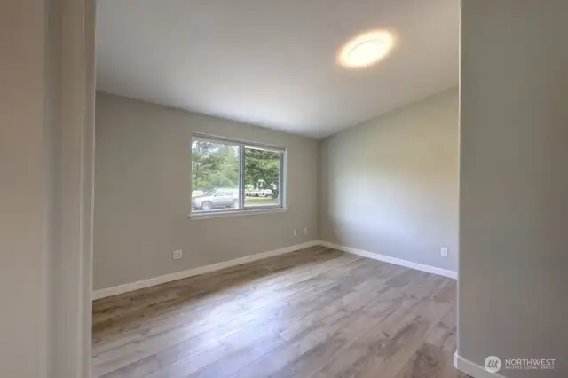 Primary suite with 3/4 bath and walk in shower.