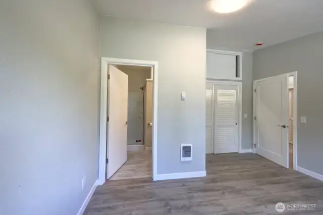 Primary suite with 3/4 bath and walk in shower.