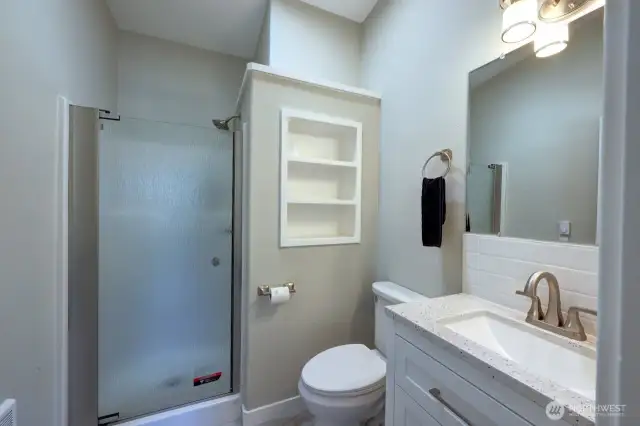 Primary suite 3/4 bath with walk in shower.