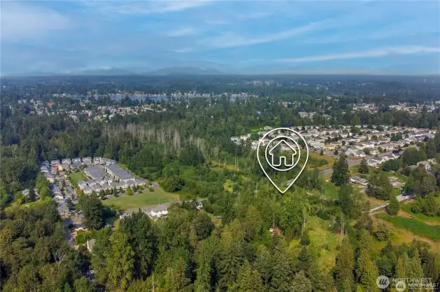 Check out this view from the sky from your property with views of Lake Meridian to the north and all the new homes surrounding this property.  Come and own this wonderful property and make plans to build when ready
