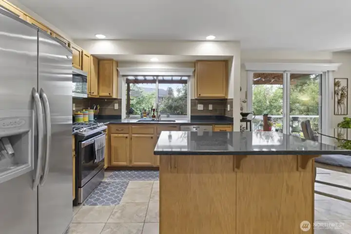 From the formal dining room, step right into the kitchen—designed with both everyday living and entertaining in mind.