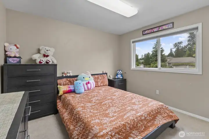 Located upstairs as well, Bedroom 3 offers views of the front yard and plenty of space to enjoy.